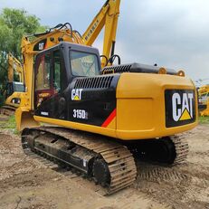 Caterpillar 315DL bandgrävare