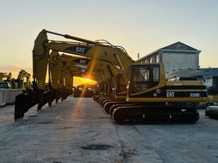 Caterpillar 320BL tracked excavator