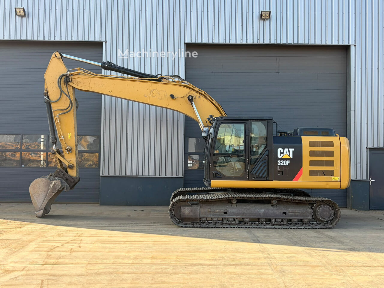 Гусеничный экскаватор Caterpillar 320FL - Machineryline