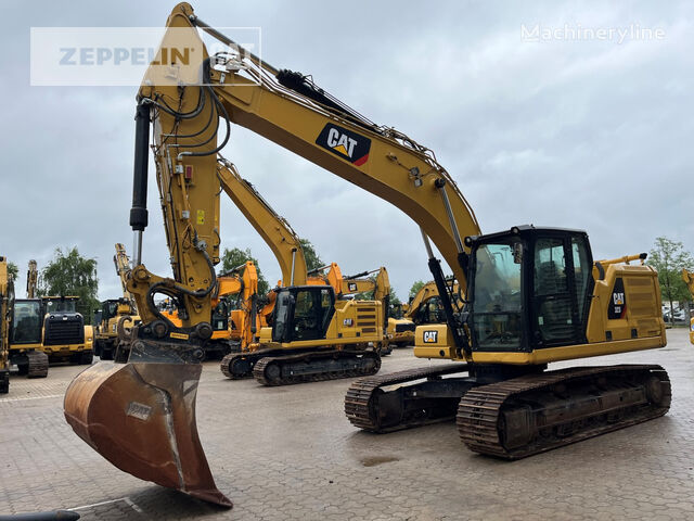 Caterpillar 323-07A rupsgraafmachine