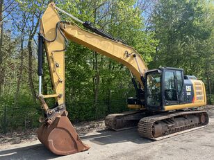 bager goseničar Caterpillar 323 E