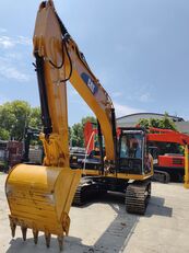 Caterpillar 323D rupsgraafmachine