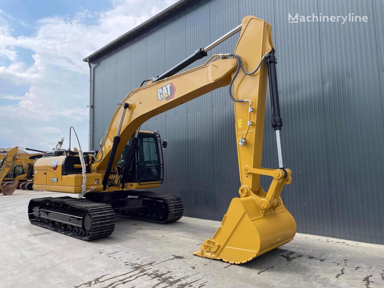 новий гусеничний екскаватор Caterpillar 323D3