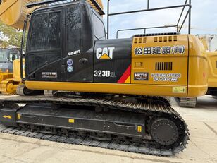Caterpillar 323DL tracked excavator