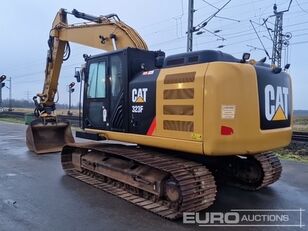 excavator dengan track Caterpillar 323FL