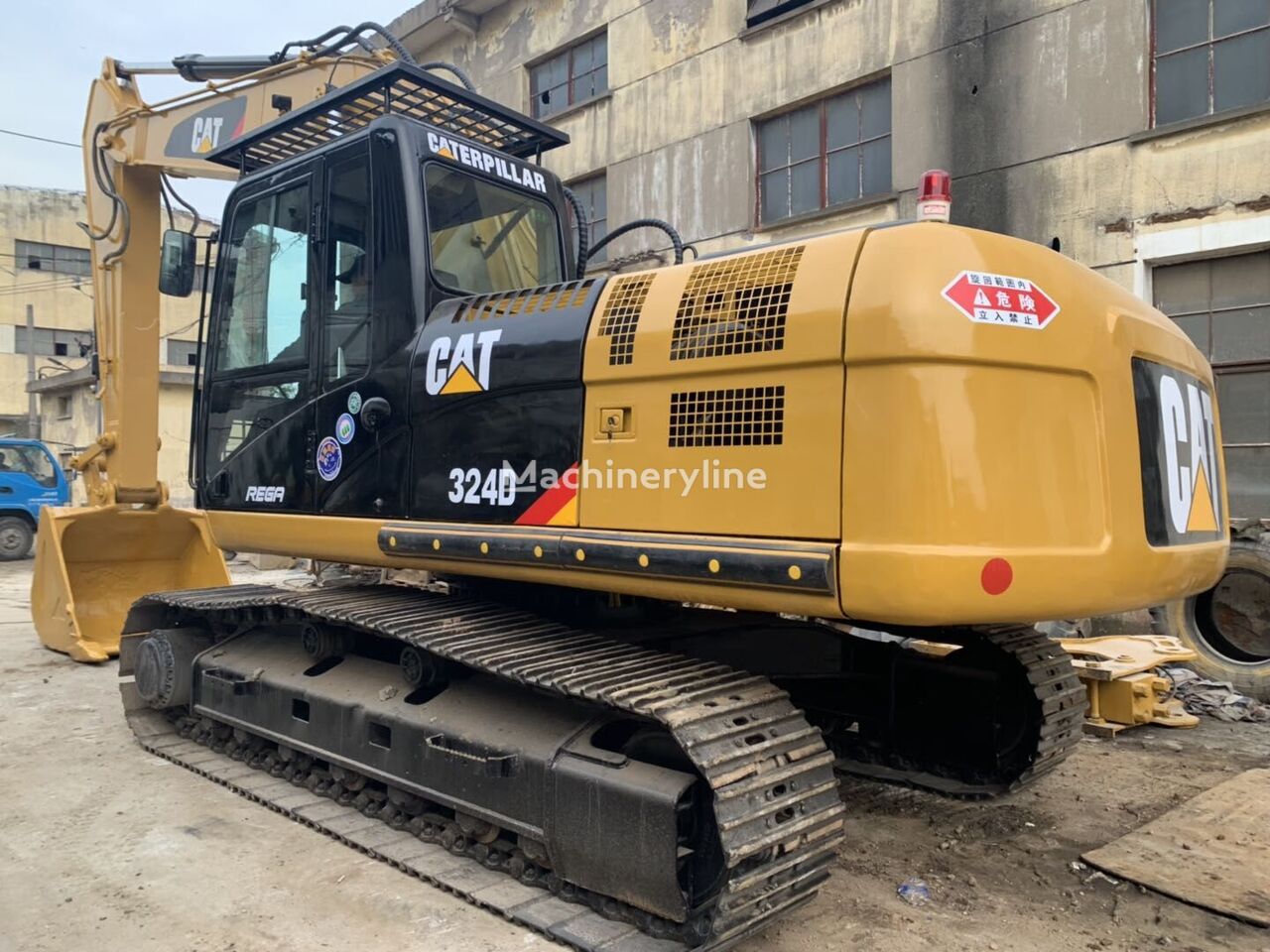 Caterpillar 324D bandgrävare