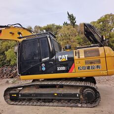 Caterpillar 324DL tracked excavator