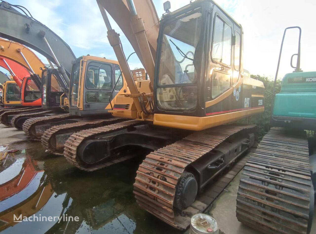 Caterpillar 325BL bager guseničar