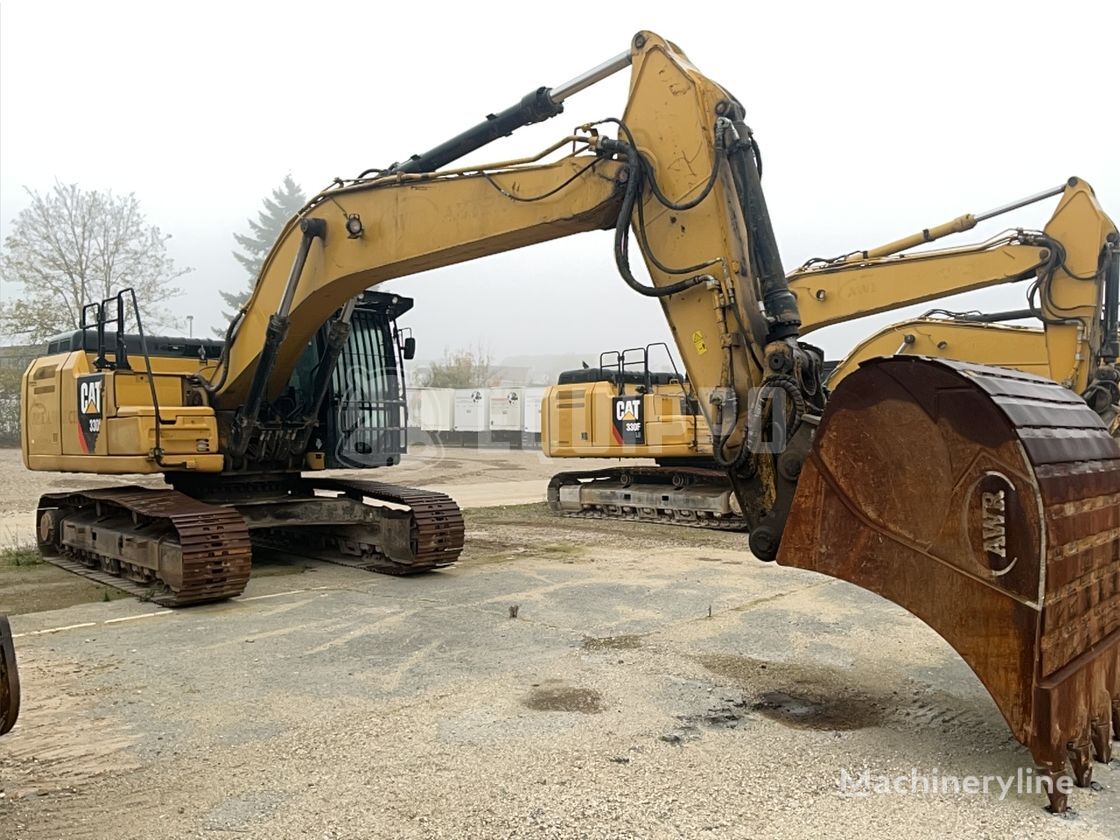 máy đào bánh xích Caterpillar 330 FLN with Oilquick OQ-80 quickcoupler and bucket