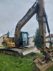 Caterpillar CAT 312D tracked excavator