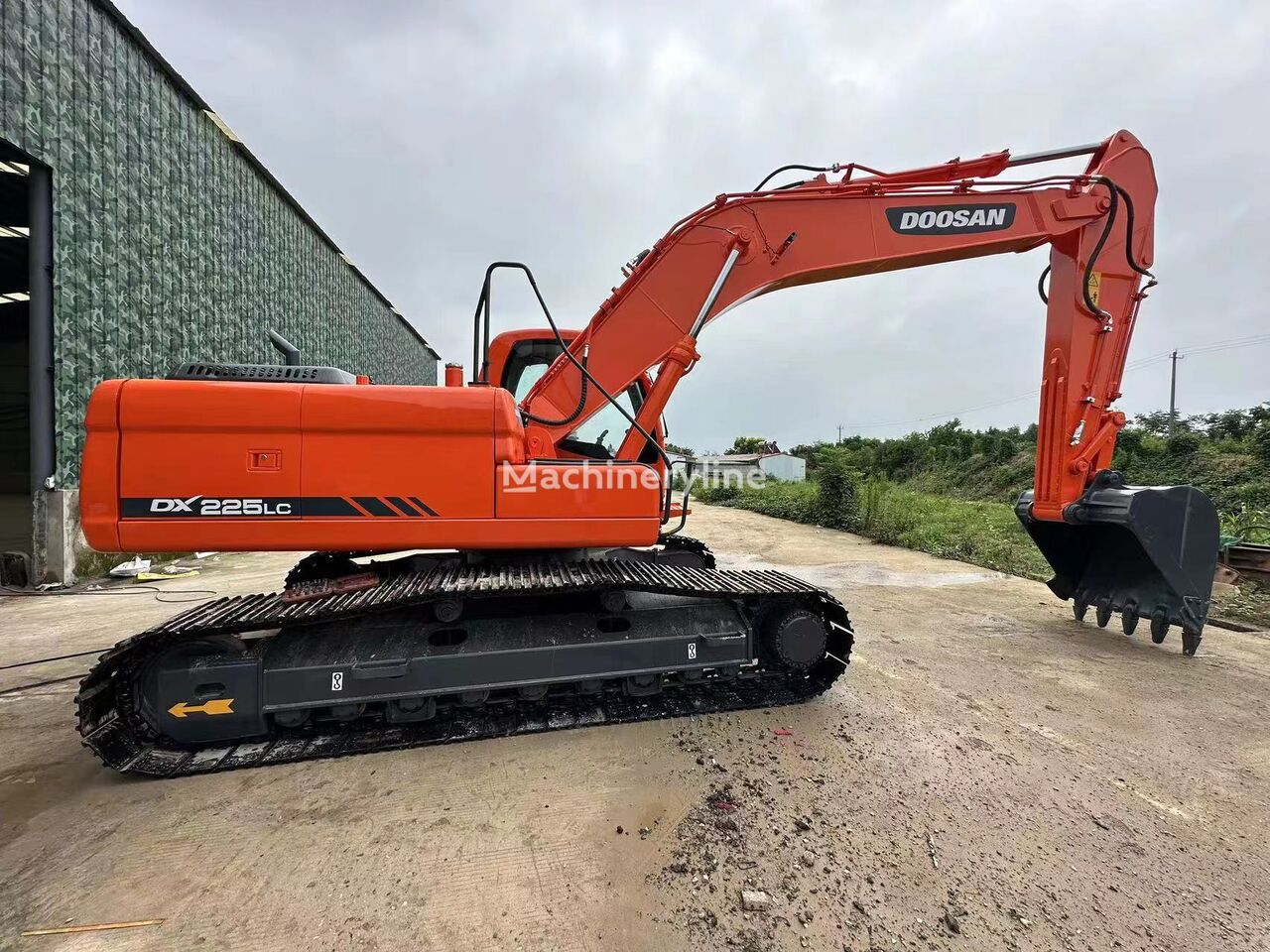 Caterpillar DX225 tracked excavator