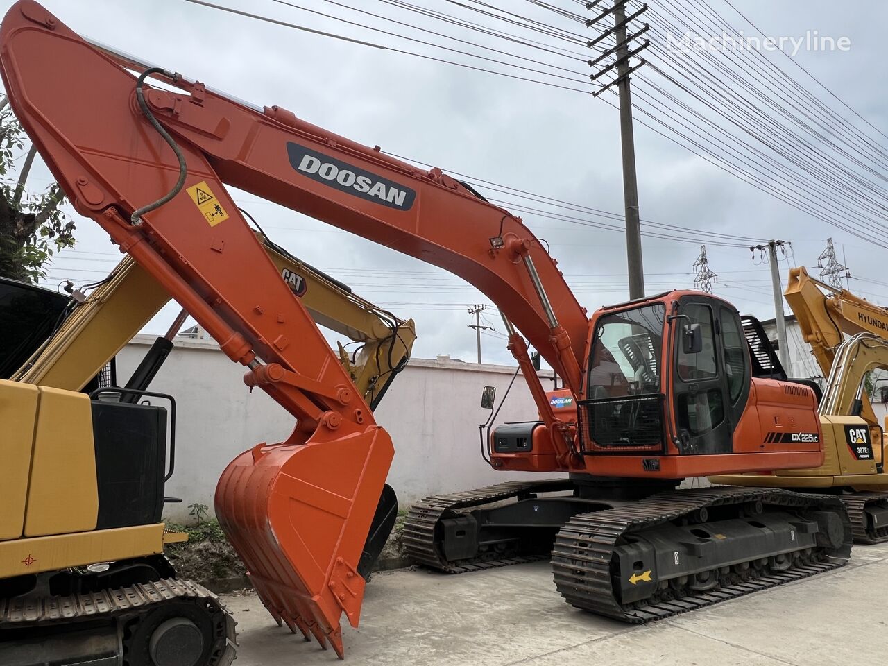 Doosan DX225LC bandgrävare