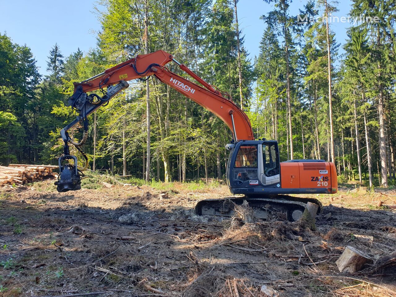 excavator dengan track Hitachi ZX 210-3 mit Schubharvester KESLA 25 RH