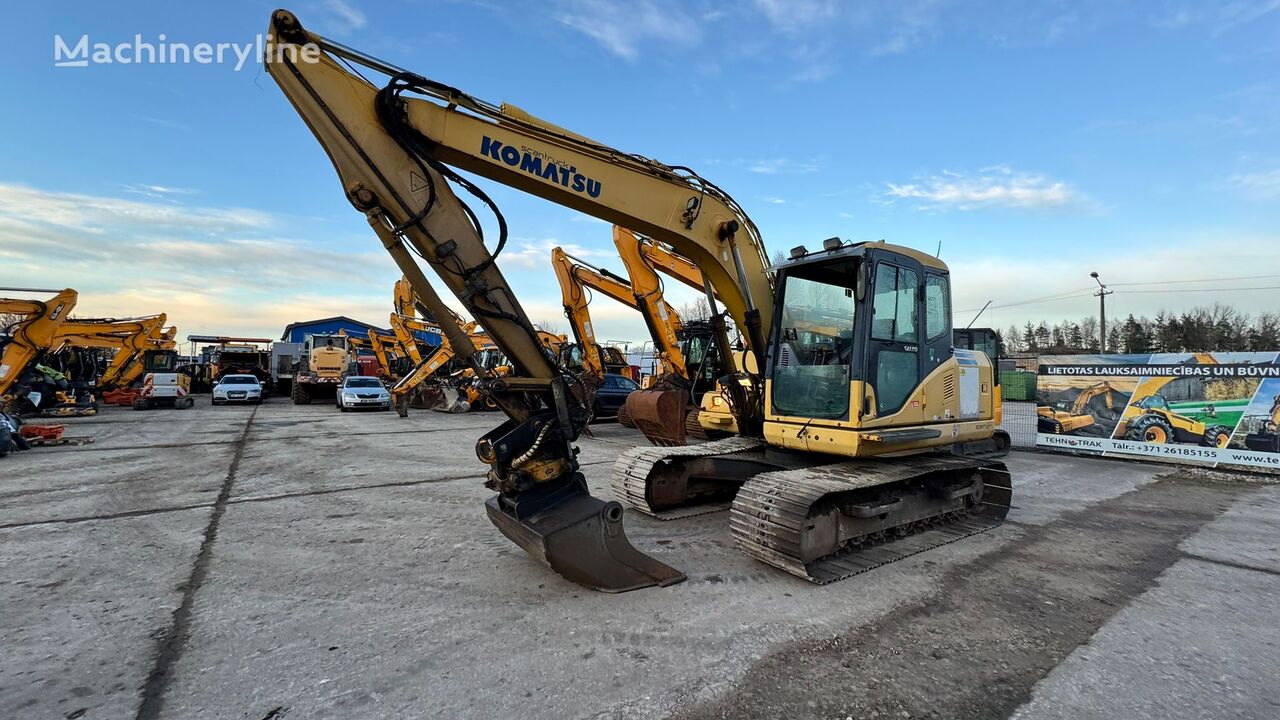 excavator dengan track Komatsu