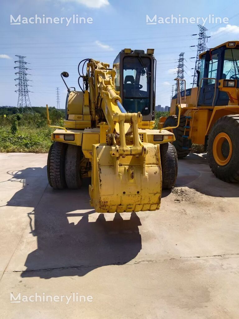 гусеничный экскаватор Komatsu 128US