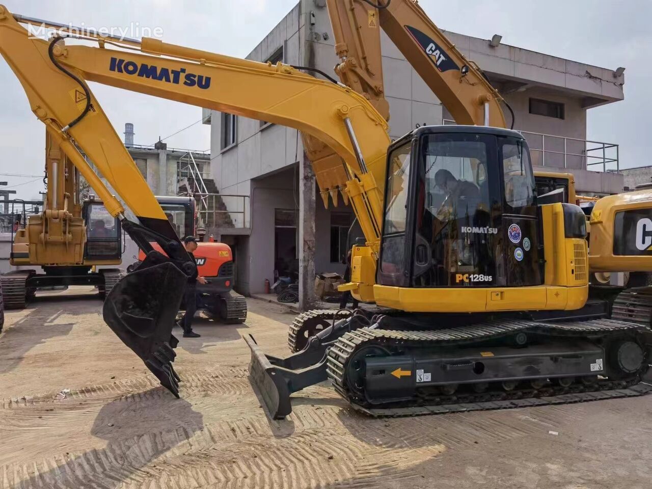 Komatsu 128us Kettenbagger