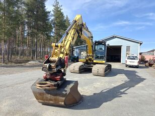 escavadora de rastos New Holland E 175 C Mets&auml;alustalla