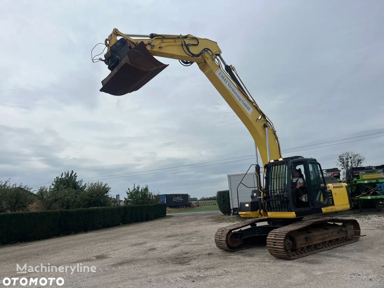 New Holland E215 C bager gusjeničar