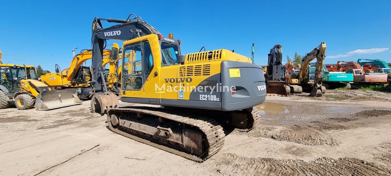 excavator dengan track Volvo EC210 B