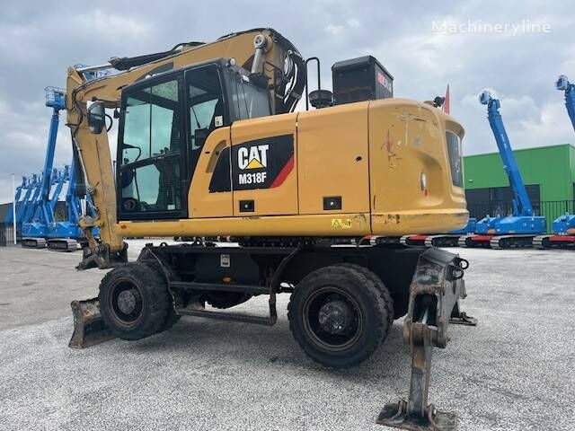 колесный экскаватор CAT M 318 F