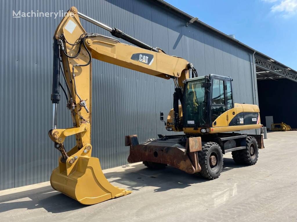 CAT M322D hjulgraver