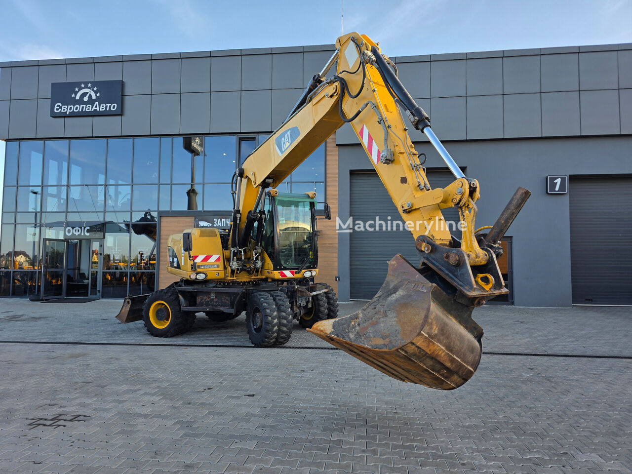 Колесен багер Caterpillar 315D - Machineryline