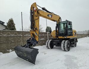 pelle sur pneus Caterpillar 315D