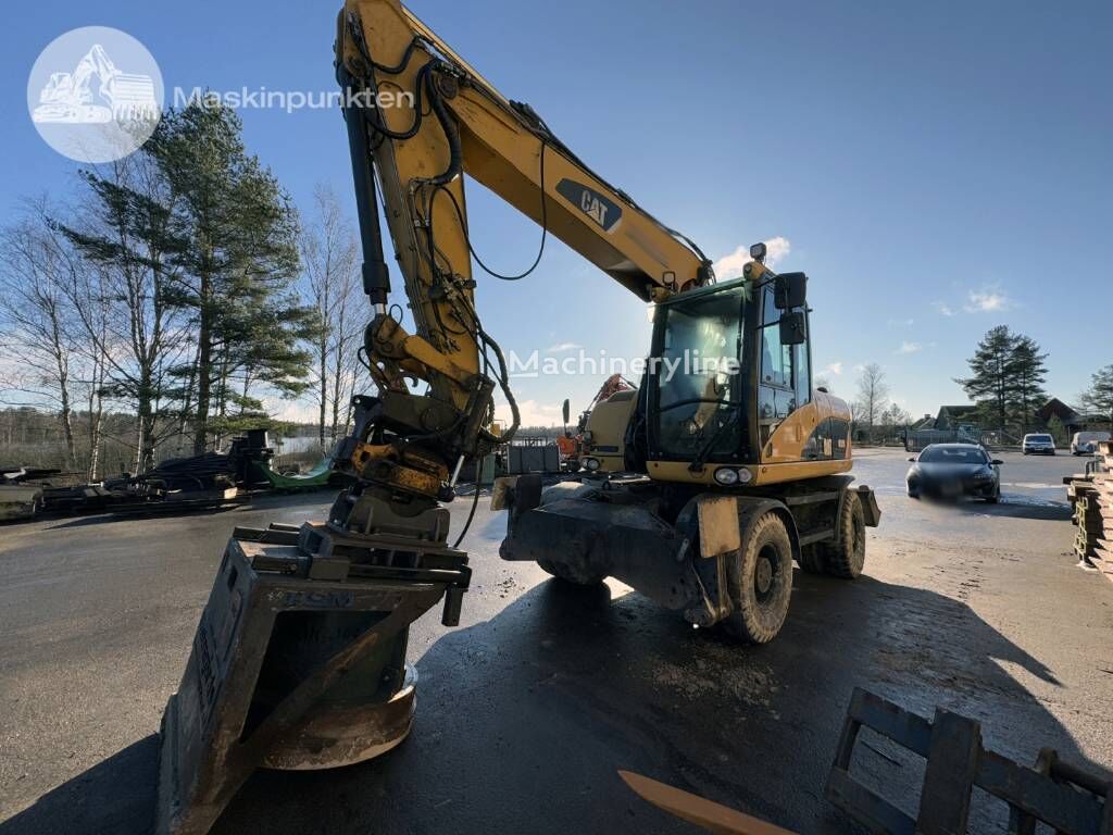 Caterpillar CAT M 315 D wheel excavator