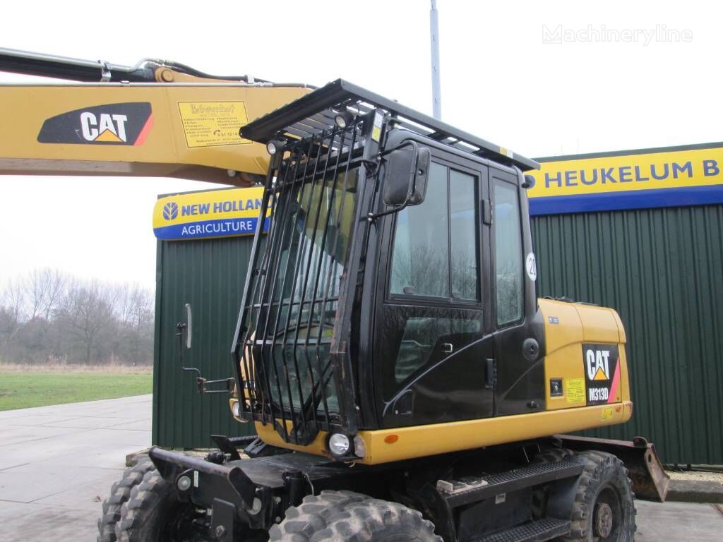 Caterpillar M 313 D cabine bescherming excavadora de ruedas