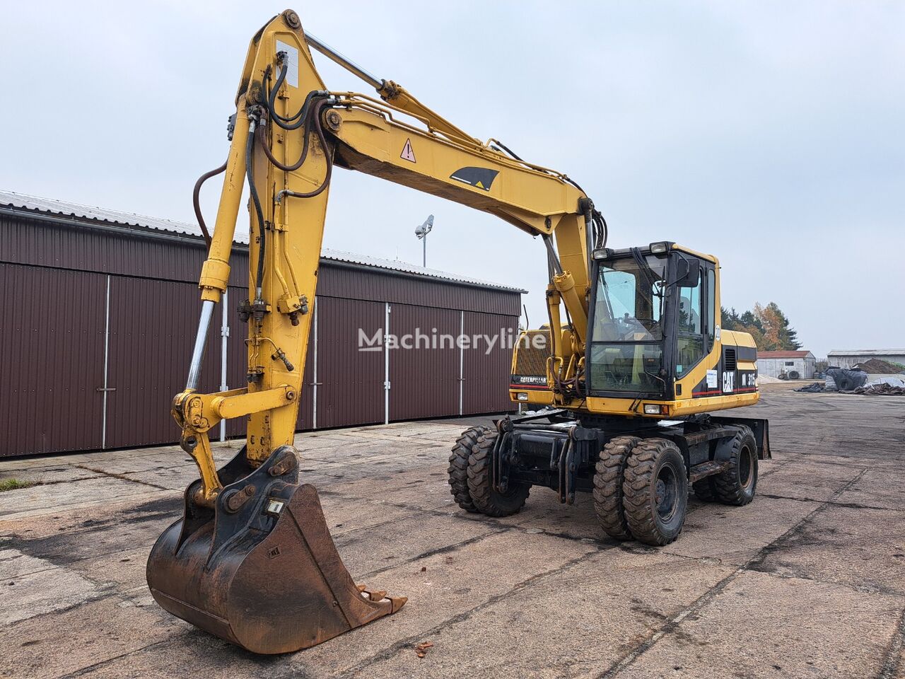 excavator roda Caterpillar M 315 4X4