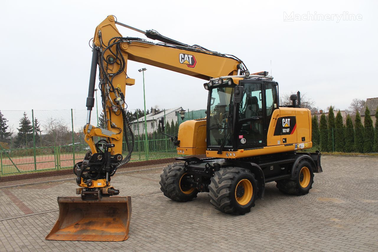 pelle sur pneus Caterpillar M 316F