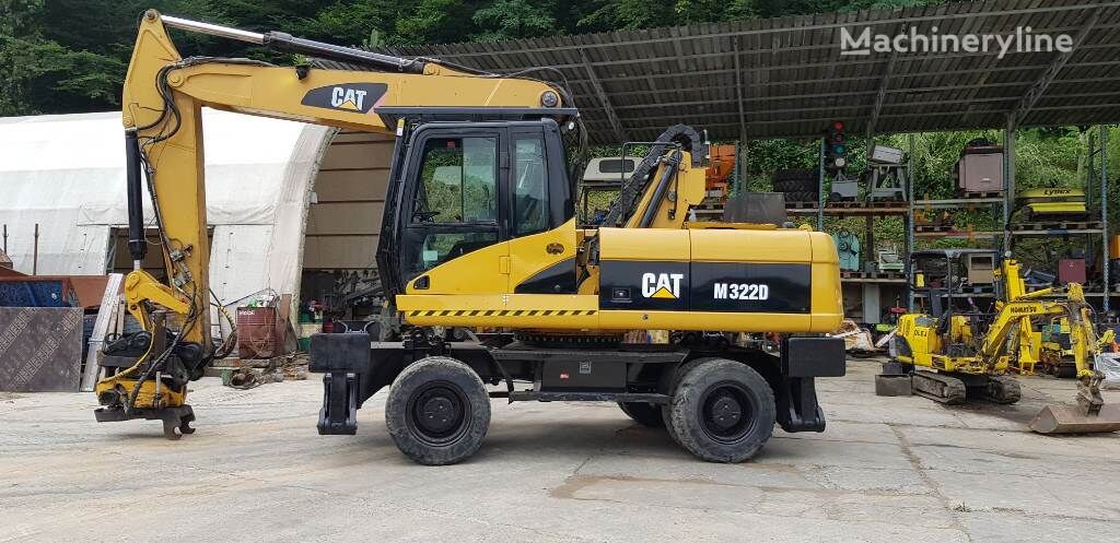 Caterpillar M 322 D riteņu ekskavators