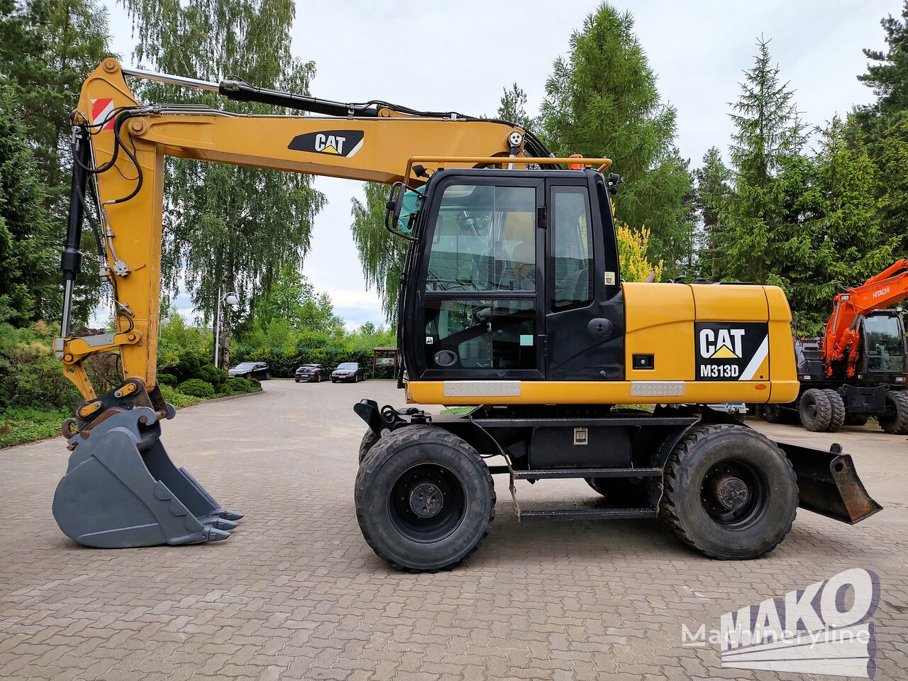 excavator roda Caterpillar M313D