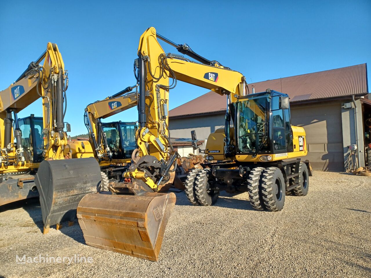 excavator pe roţi Caterpillar M313D