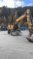 Caterpillar M313D excavadora de ruedas