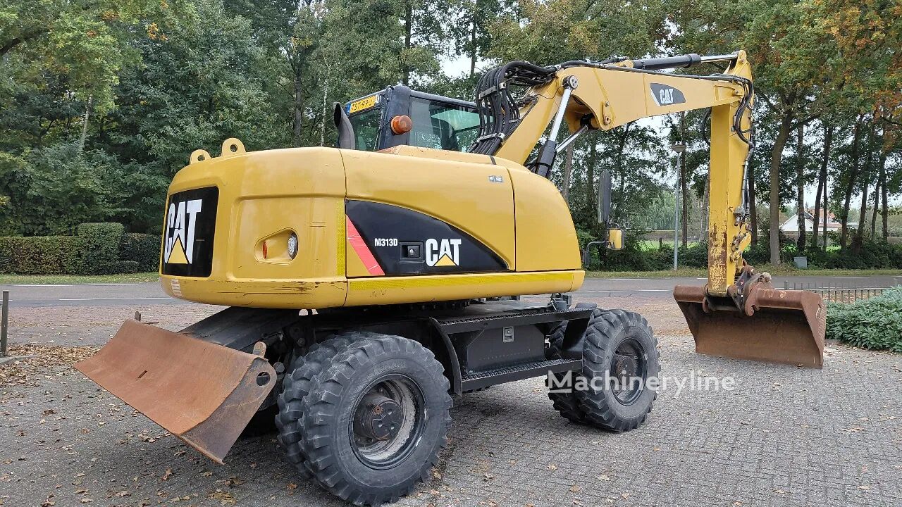 بيع حفارة ذات العجلات Caterpillar M313D / Dutch machine / 12800 hours | Machineryline حفارة ذات العجلات Caterpillar M313D / Dutch machine / 12800 hours - Machineryline