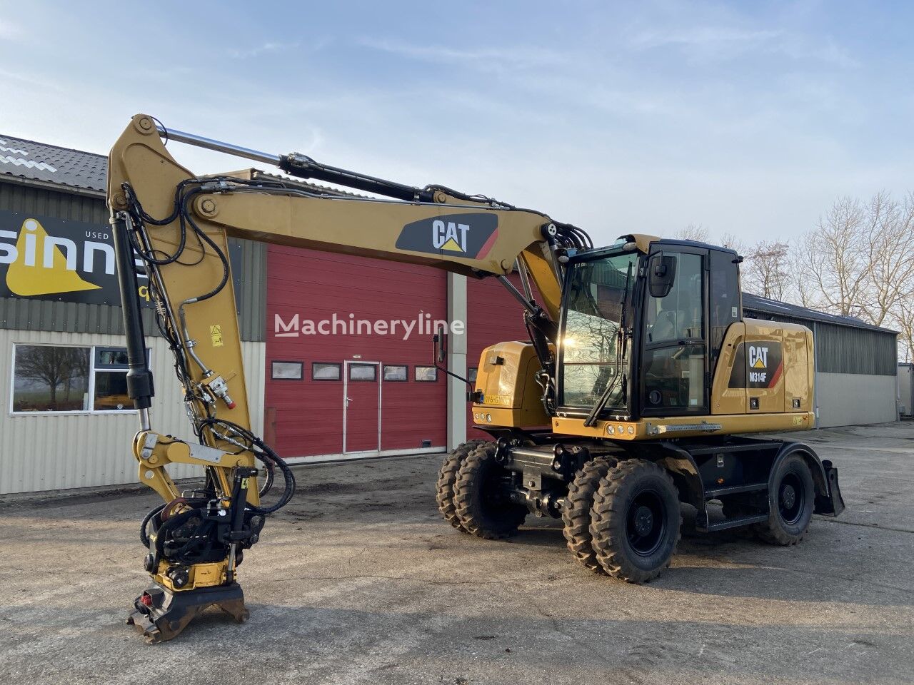 Caterpillar M314F wheel excavator