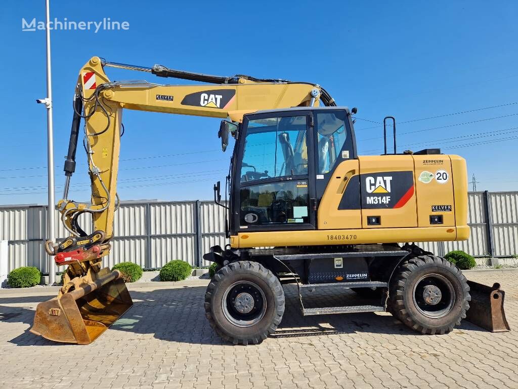 بیل مکانیکی چرخ لاستیکی Caterpillar M314F * 2018r. * 3 831 mth * OQ 65 * full service