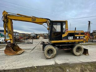 휠 굴착기 Caterpillar M315