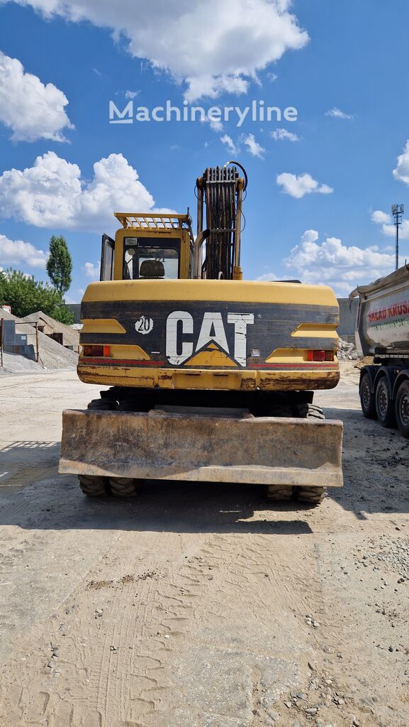 Caterpillar M315 wheel excavator