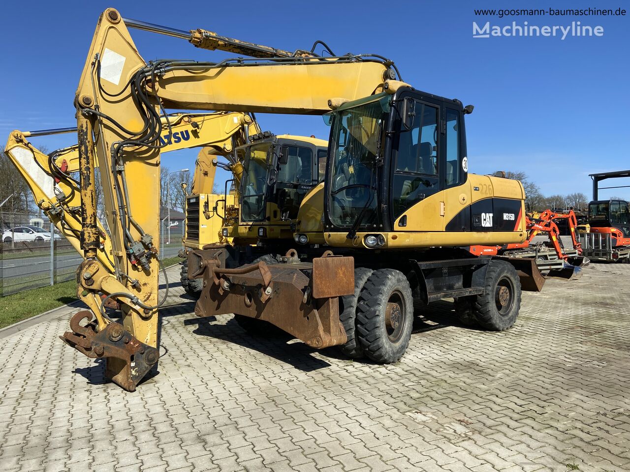 Caterpillar M315D excavadora de ruedas