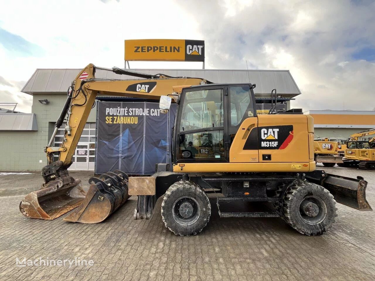 колесный экскаватор Caterpillar M315F