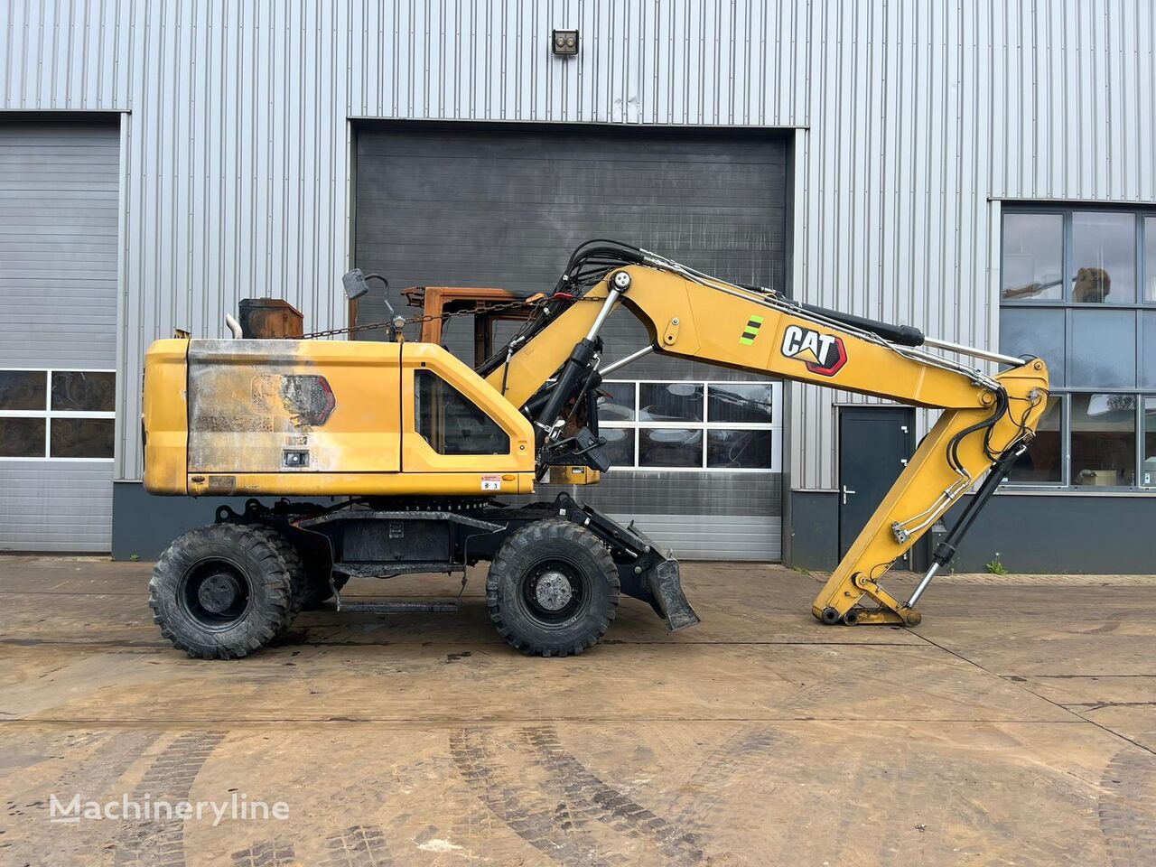 Caterpillar M316 wheel excavator