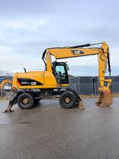 колесный экскаватор Caterpillar M316