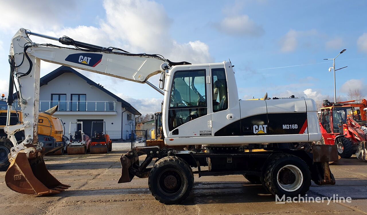 колісний екскаватор Caterpillar M316D