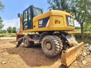 Caterpillar M317 wheel excavator