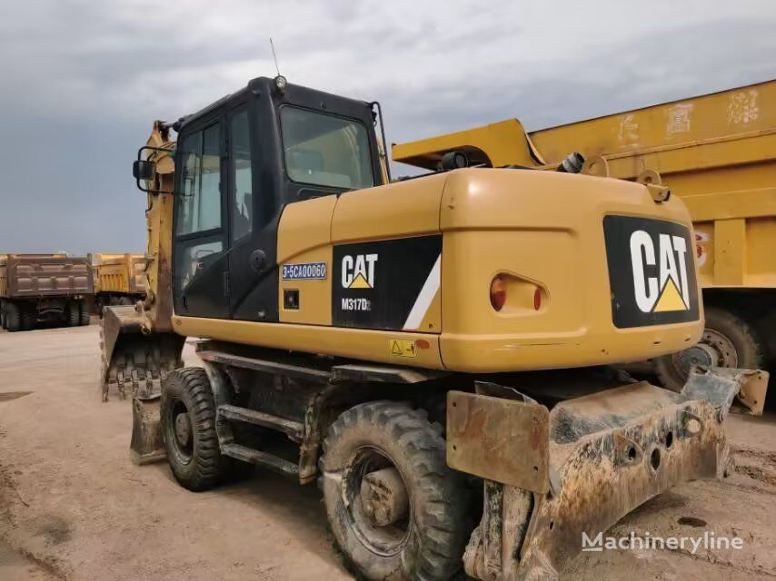 Caterpillar M317D2 excavadora de ruedas