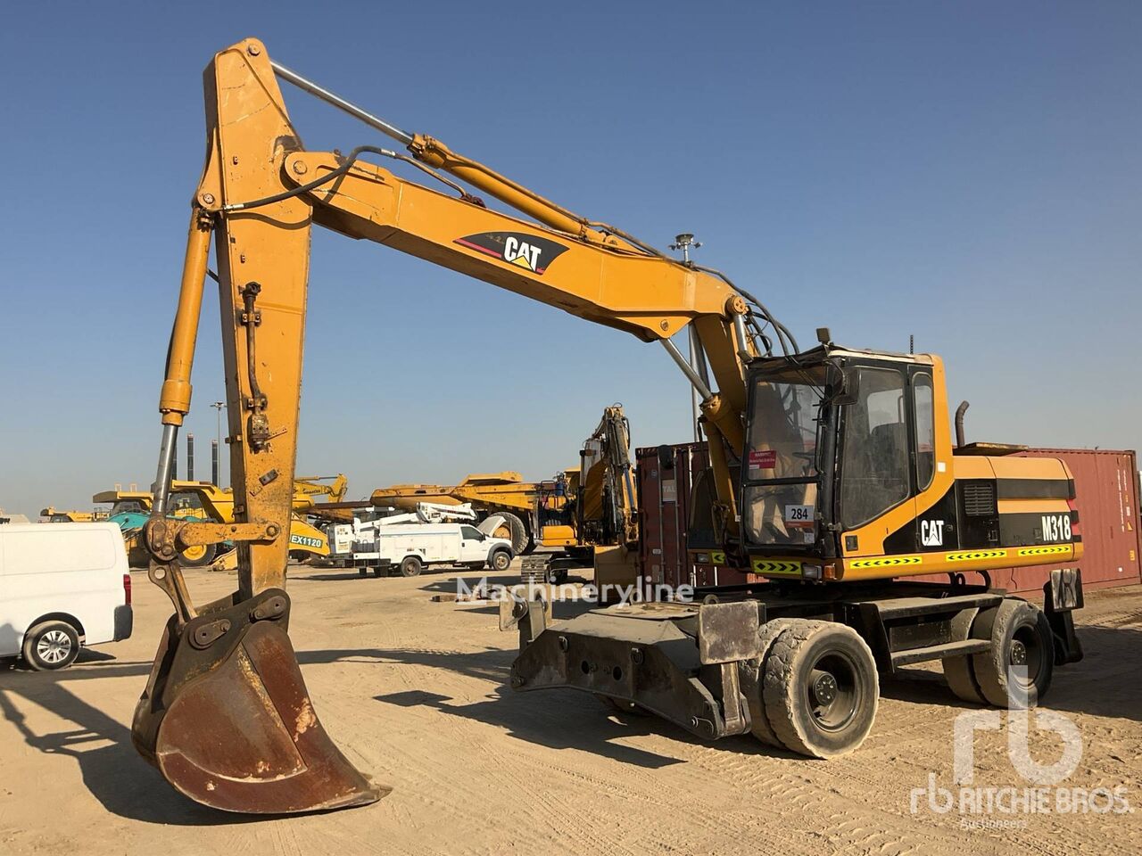 Caterpillar M318 excavadora de ruedas