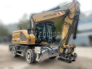 колесный экскаватор Caterpillar M318 with variable angle boom with Oilquick OQ80 quickcoupler (w