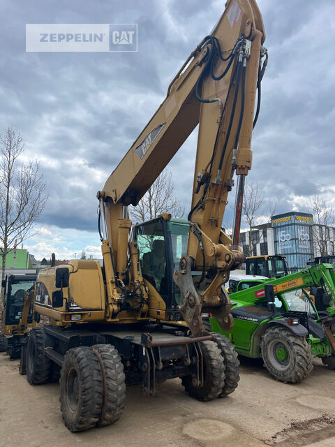 حفارة ذات العجلات Caterpillar M318C - Machineryline